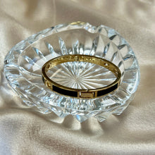 Load image into Gallery viewer, Coach Gold & Black Logo Enamel Bangle