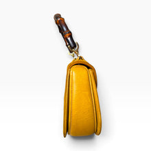 Load image into Gallery viewer, Vintage Gucci Bamboo Suede Top Handle Bag in Mustard
