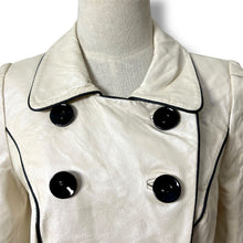 Load image into Gallery viewer, Vero Moda White Pearl Sheen Cropped Leather Jacket with Black Piping – New with Tags

