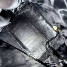 Load image into Gallery viewer, Chanel Black Lambskin Drawstring Bucket Bag, 1994–1996 (Serial 3514768)
