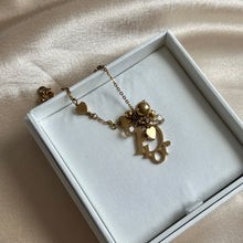 Load image into Gallery viewer, Christian Dior Gold-Tone Heart Charm Bracelet, Early 2000s
